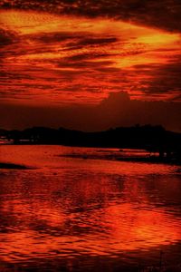 Scenic view of sea at sunset