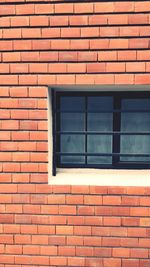 Full frame shot of window on wall of building