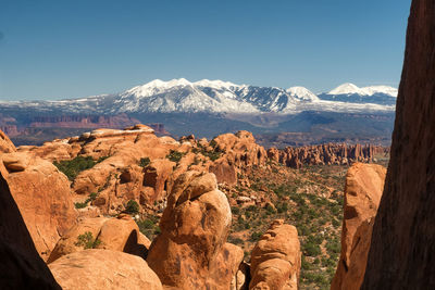 Scenic view of mountains against clear sky