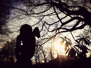 Silhouette of people at sunset