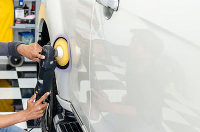 Close-up of man working in bus