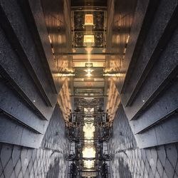 Low angle view of illuminated staircase in building