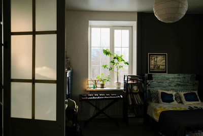 Cozy gray modern bedroom interior with furniture