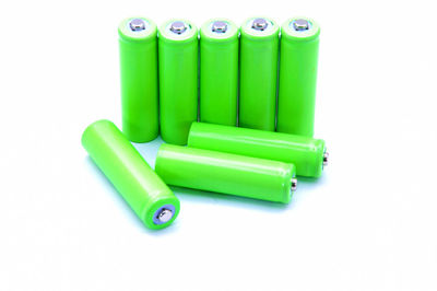 Close-up of colored pencils over white background