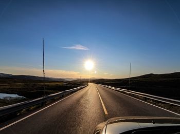 Road against sky during sunset