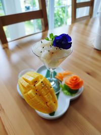 High angle view of fruits in glass on table