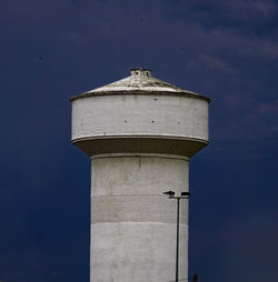 Low angle view of water tower against sky