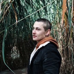 Portrait of young man looking away