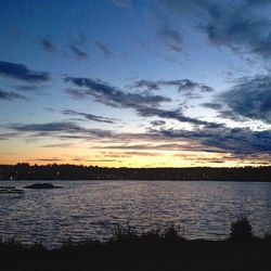 Scenic view of sea at sunset