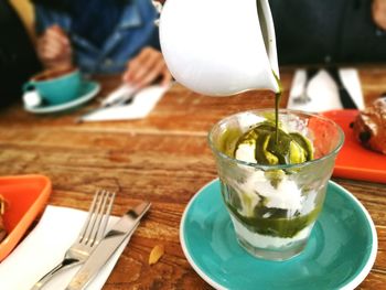 Close-up of ice cream in cup on table