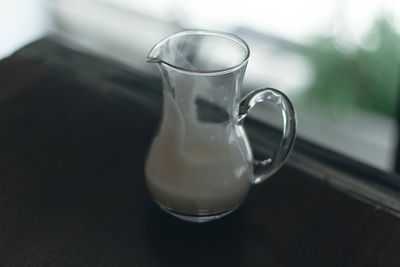 Close-up of coffee cup on table