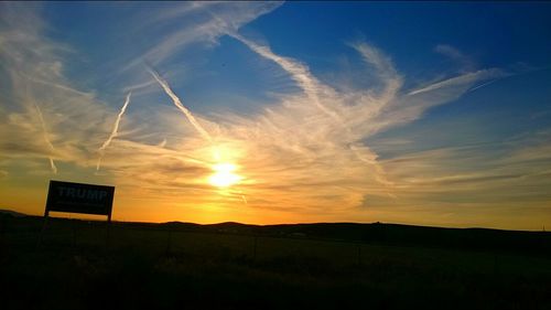 Scenic view of landscape at sunset