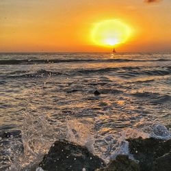 Scenic view of sea at sunset