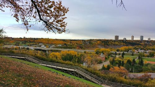 View of railroad tracks against cloudy sky