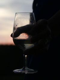 Close-up of a man drinking glass