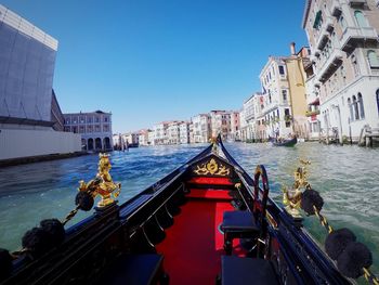 Boat on canal in city