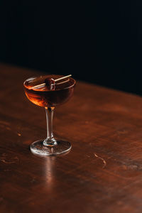 Close-up of wineglass on table