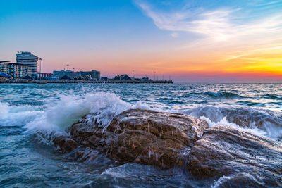 Scenic view of sea against sky during sunset