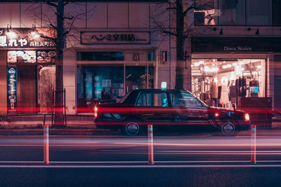 Cars on road at night