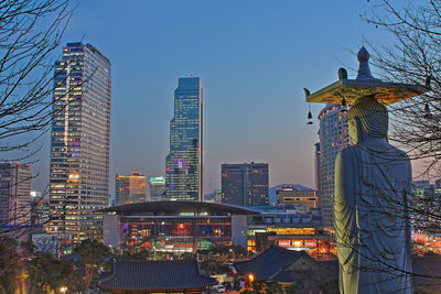 I took special picture of the budda statue in the temple and the night view of buildings in the city