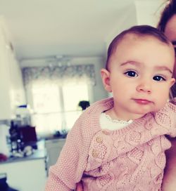 Portrait of cute baby at home