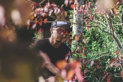 Young man looking away outdoors