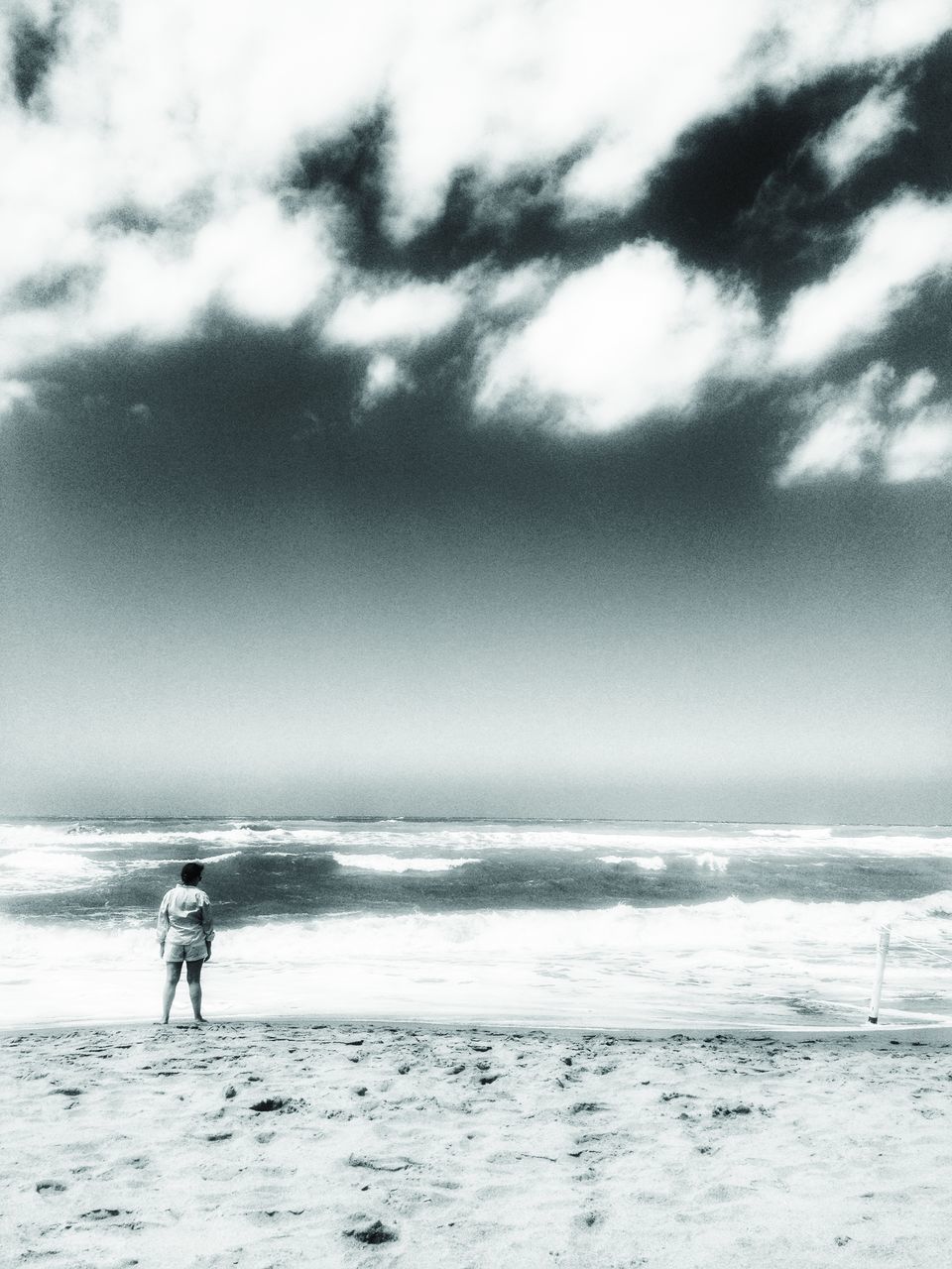 sea, horizon over water, beach, lifestyles, leisure activity, sky, full length, water, shore, rear view, cloud - sky, men, standing, nature, beauty in nature, walking, tranquil scene