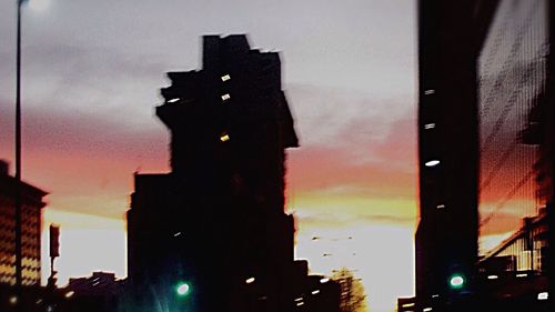 Low angle view of building against sky at night