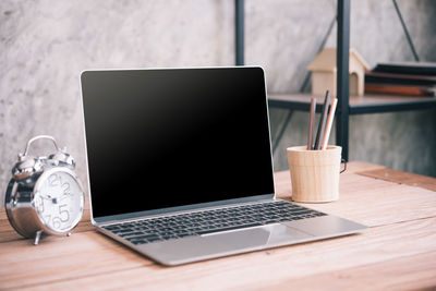 Close-up of laptop on table