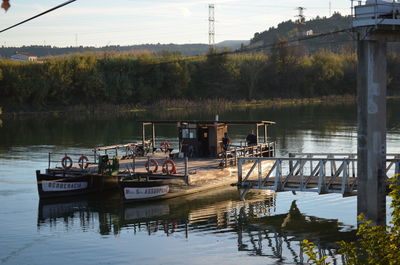 Boats in calm lake