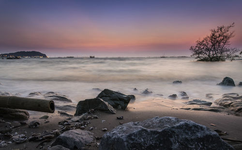 Scenic view of sea against sky during sunset