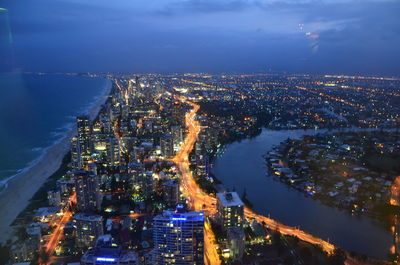 High angle view of illuminated city buildings