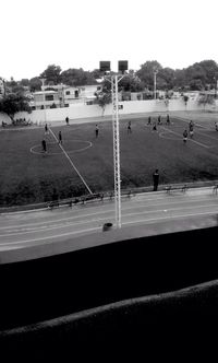 People on field against sky