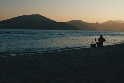 Scenic view of sea at sunset