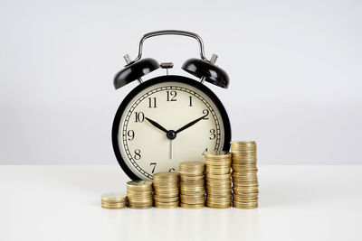 Clock tower against white background