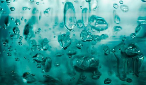 Full frame shot of wet glass