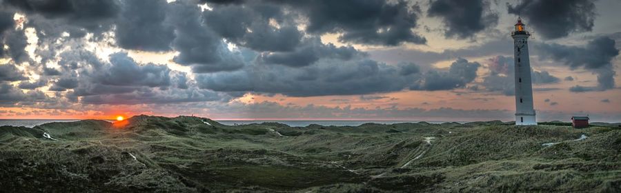 Panoramic view of land against sky during sunset