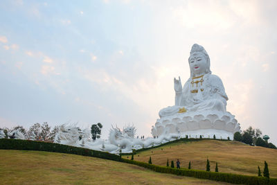 Beautiful white statues of the ancient guanyin are large