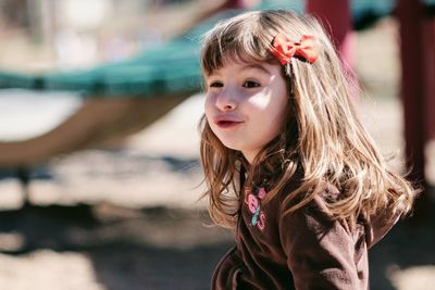 Close-up of innocent girl at playground