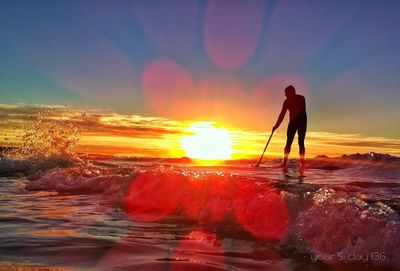 Scenic view of sea at sunset