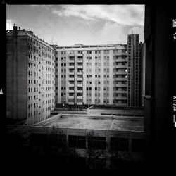 Buildings in city against sky