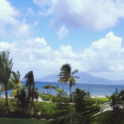 Scenic view of sea against cloudy sky