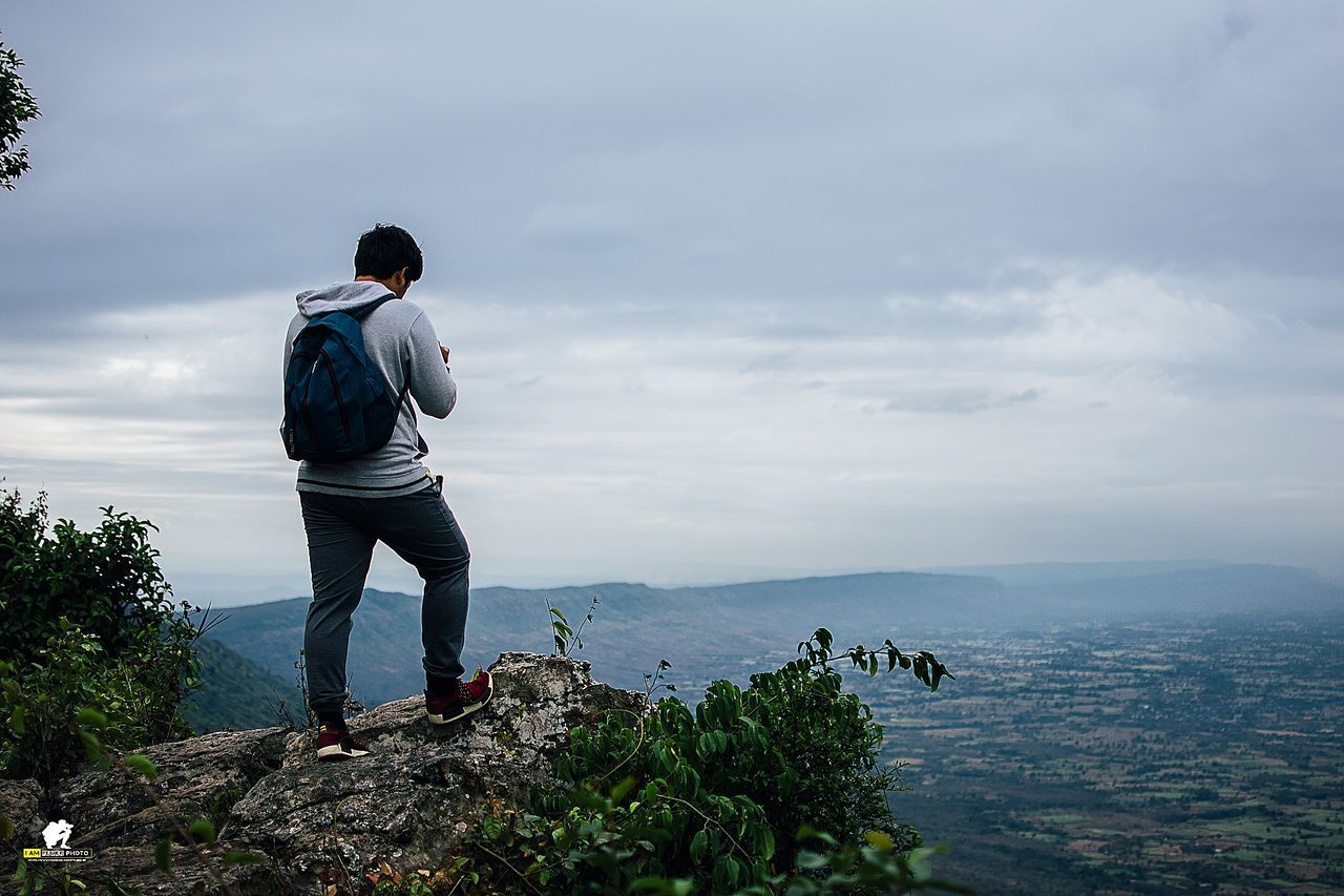 sky, cloud - sky, one person, standing, scenics - nature, real people, beauty in nature, lifestyles, casual clothing, rear view, full length, nature, leisure activity, water, men, activity, sea, solid, day, looking at view, outdoors