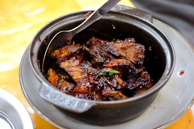 Close-up of meat in bowl on plate