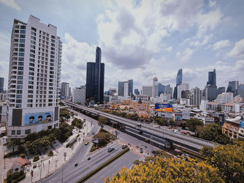 High angle view of city buildings against sky