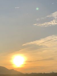 Scenic view of landscape against sky during sunset