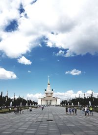 Group of people in front of historical building