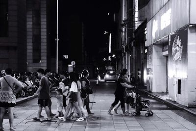 Woman standing on city street