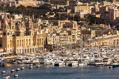 Boats moored at harbor