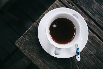 High angle view of coffee cup on table